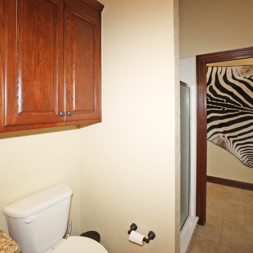 3/4 Bath with shower. Original framing for a door beteen the bathroom and Executive Office 1 is still intact.