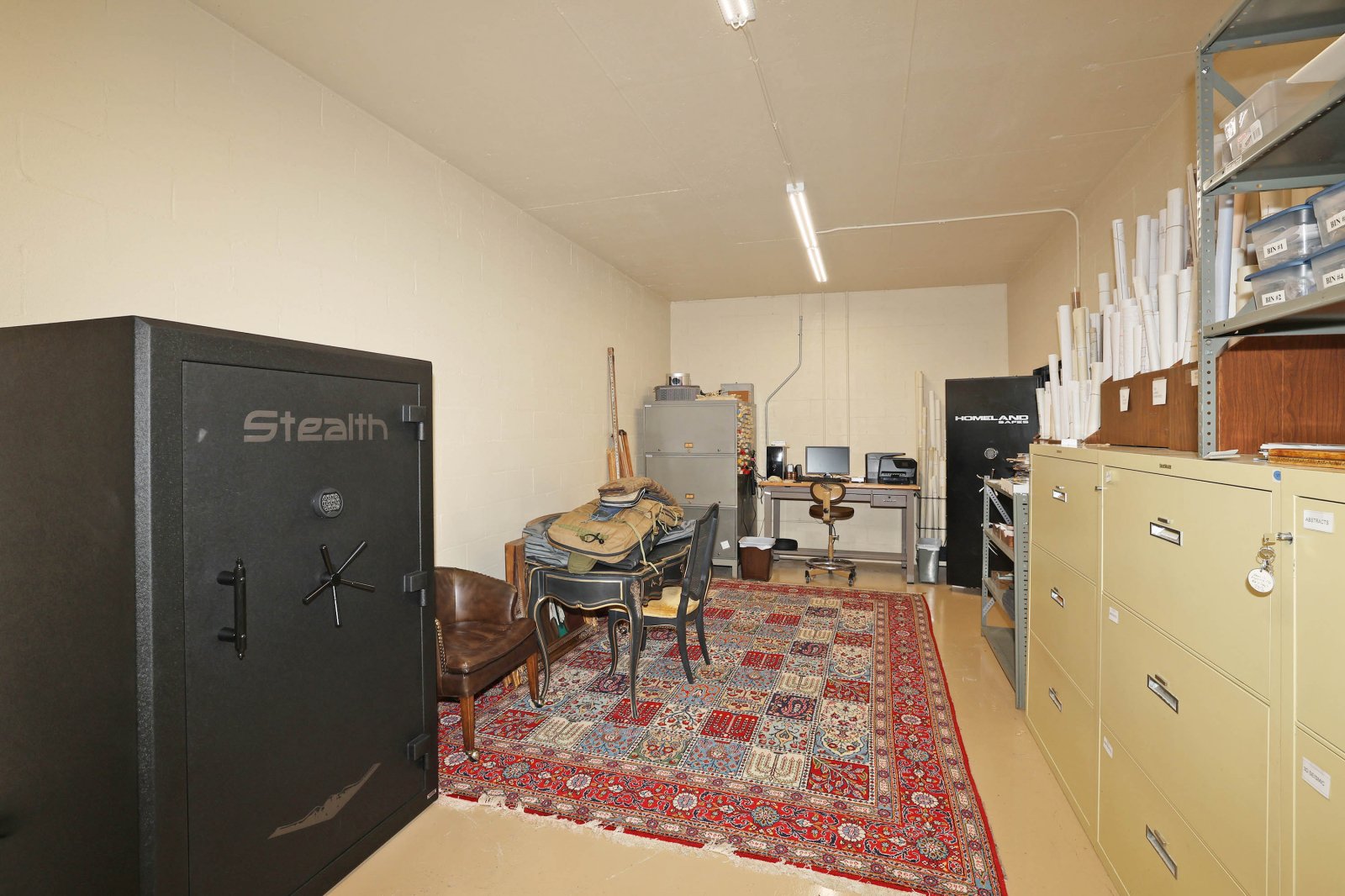 Safe room is climate-controlled and fireproof per the builder. 