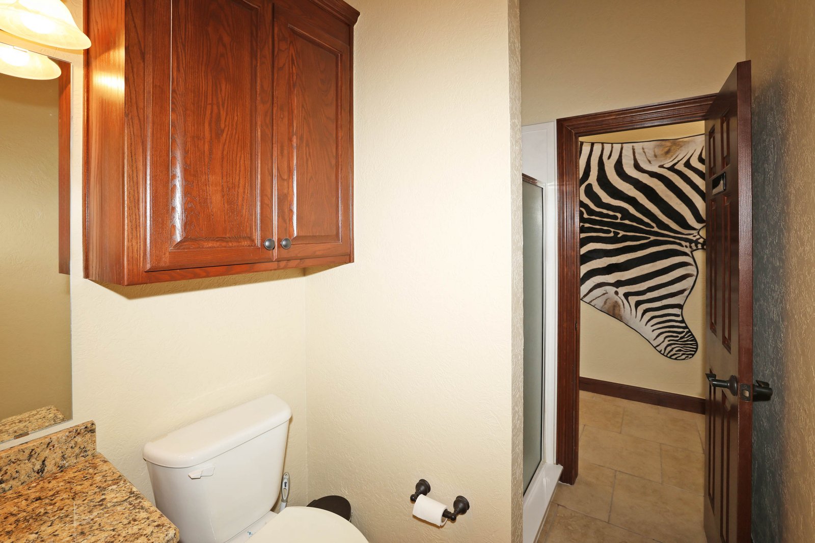 3/4 Bath with shower. Original framing for a door between the bathroom and Executive Office 1 is still intact. 
